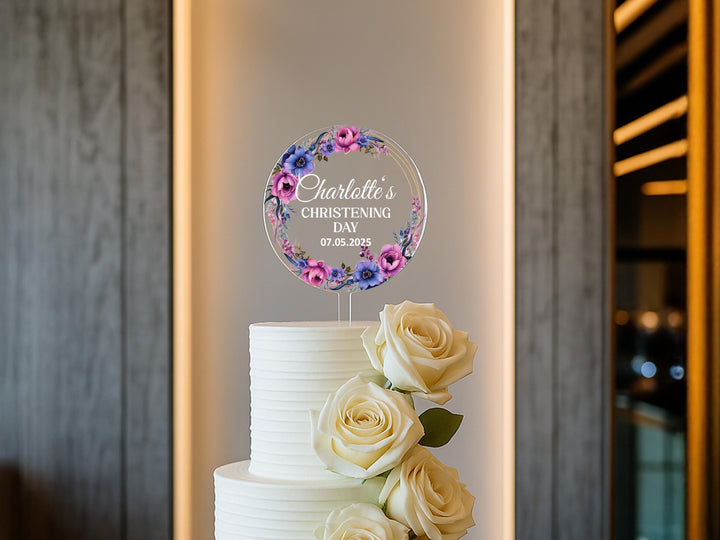 a wedding cake with flowers on top of it