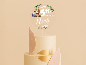 a birthday cake with a topper on it