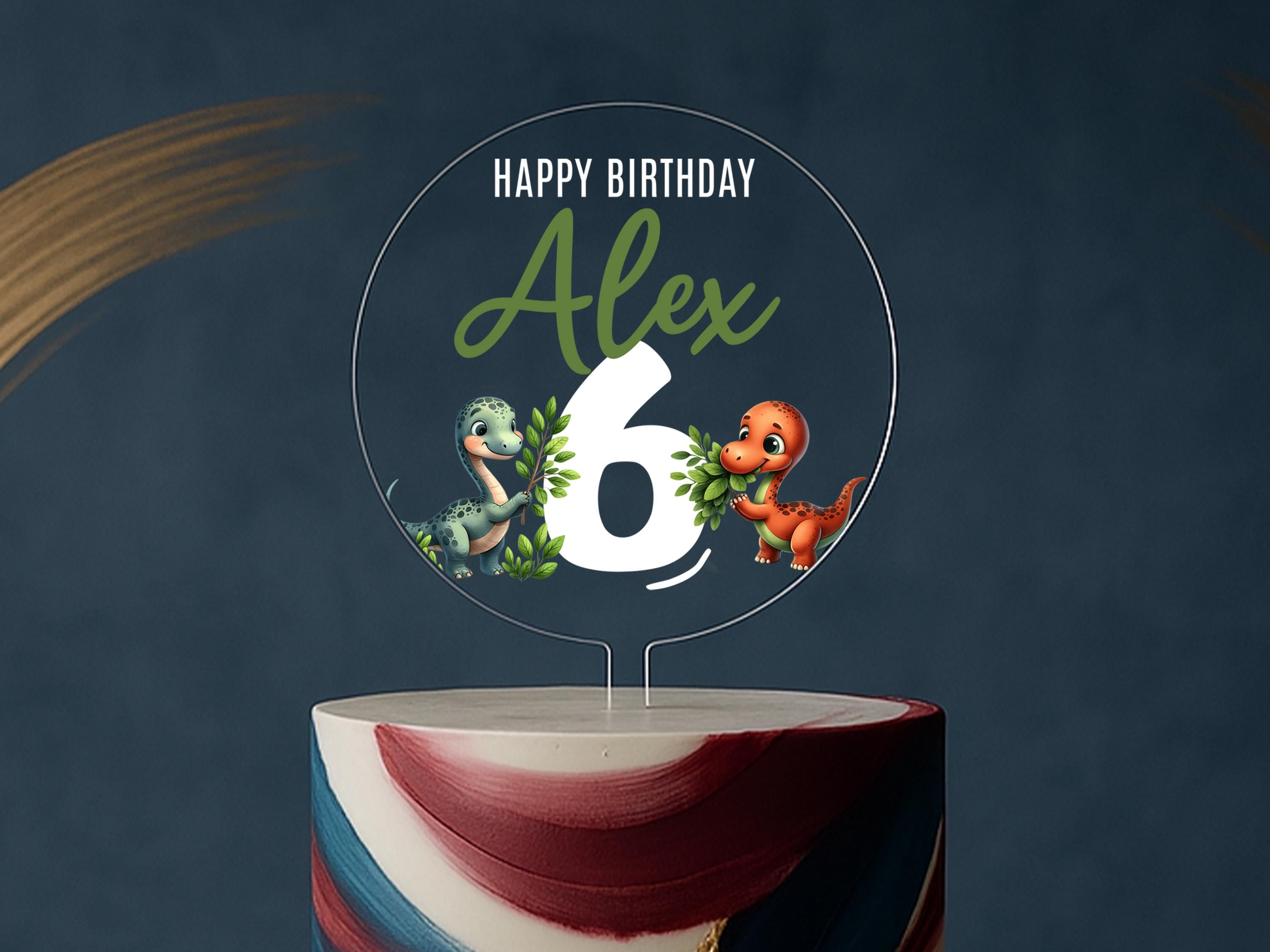 a birthday cake with the number six on it