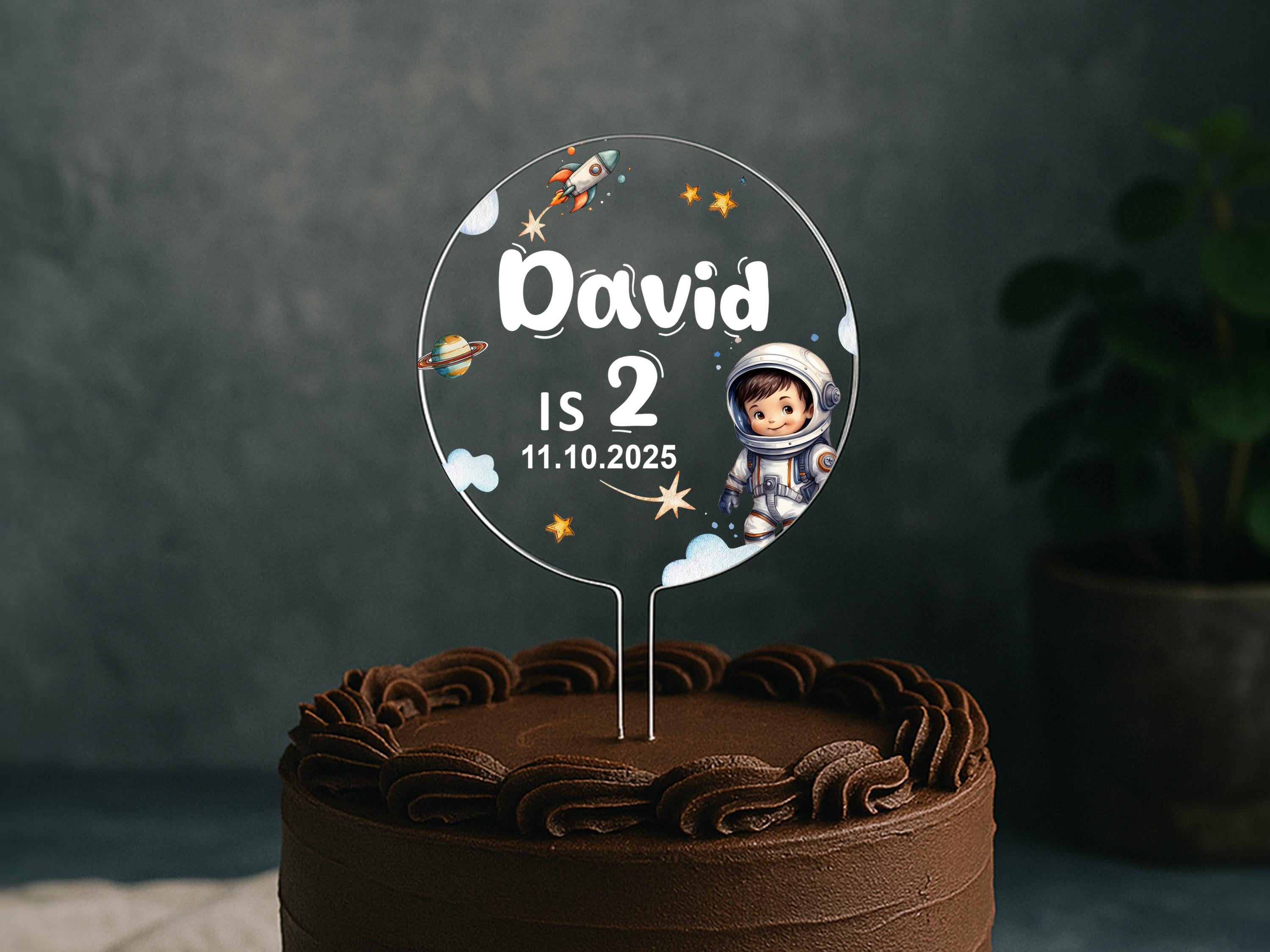 a birthday cake with a cake topper on it