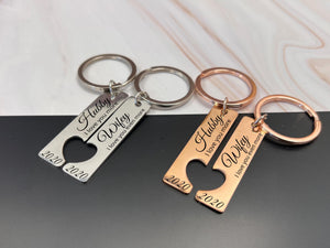 Close-up of romantic rose gold heart cut-out keyring set, featuring Hubby and Wifey inscriptions with year 2020, ideal for newlyweds.