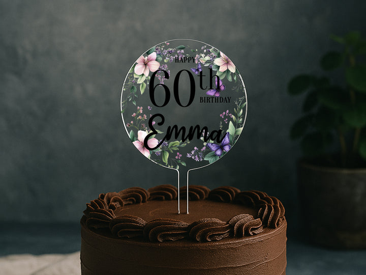 a chocolate cake with a happy 80th birthday cake topper