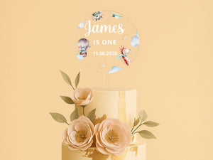 a three tiered cake with flowers on top