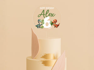 a three tiered cake with a happy birthday topper