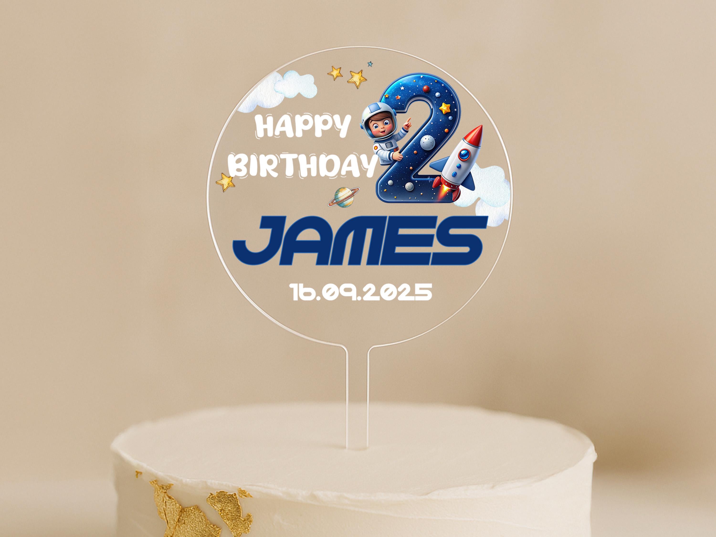 Personalised space rocket birthday cake topper with astronaut, stars, and custom name