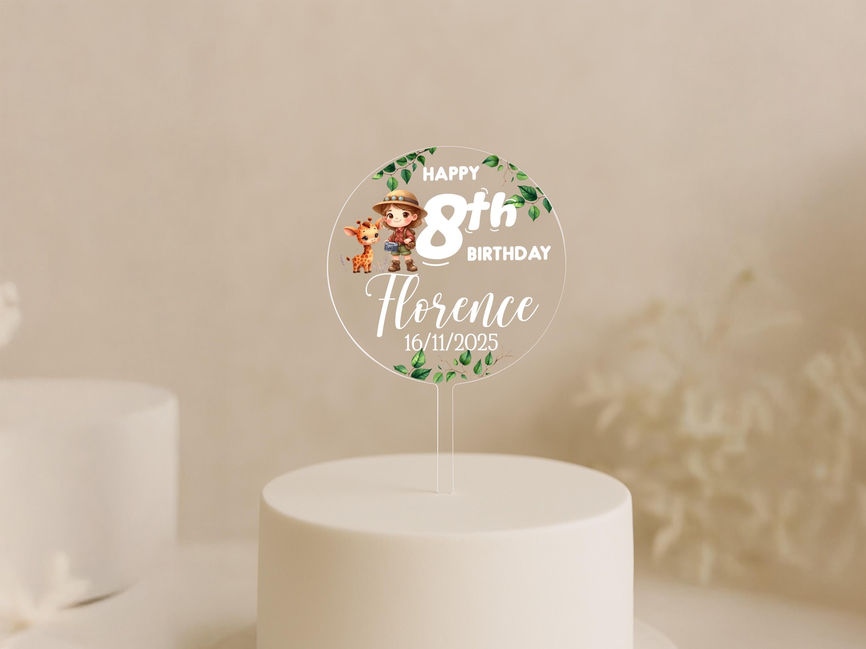 a white cake with a happy 8th birthday cake topper