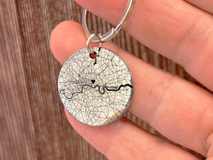 Personalised stainless steel keychain with custom engraved map on the front