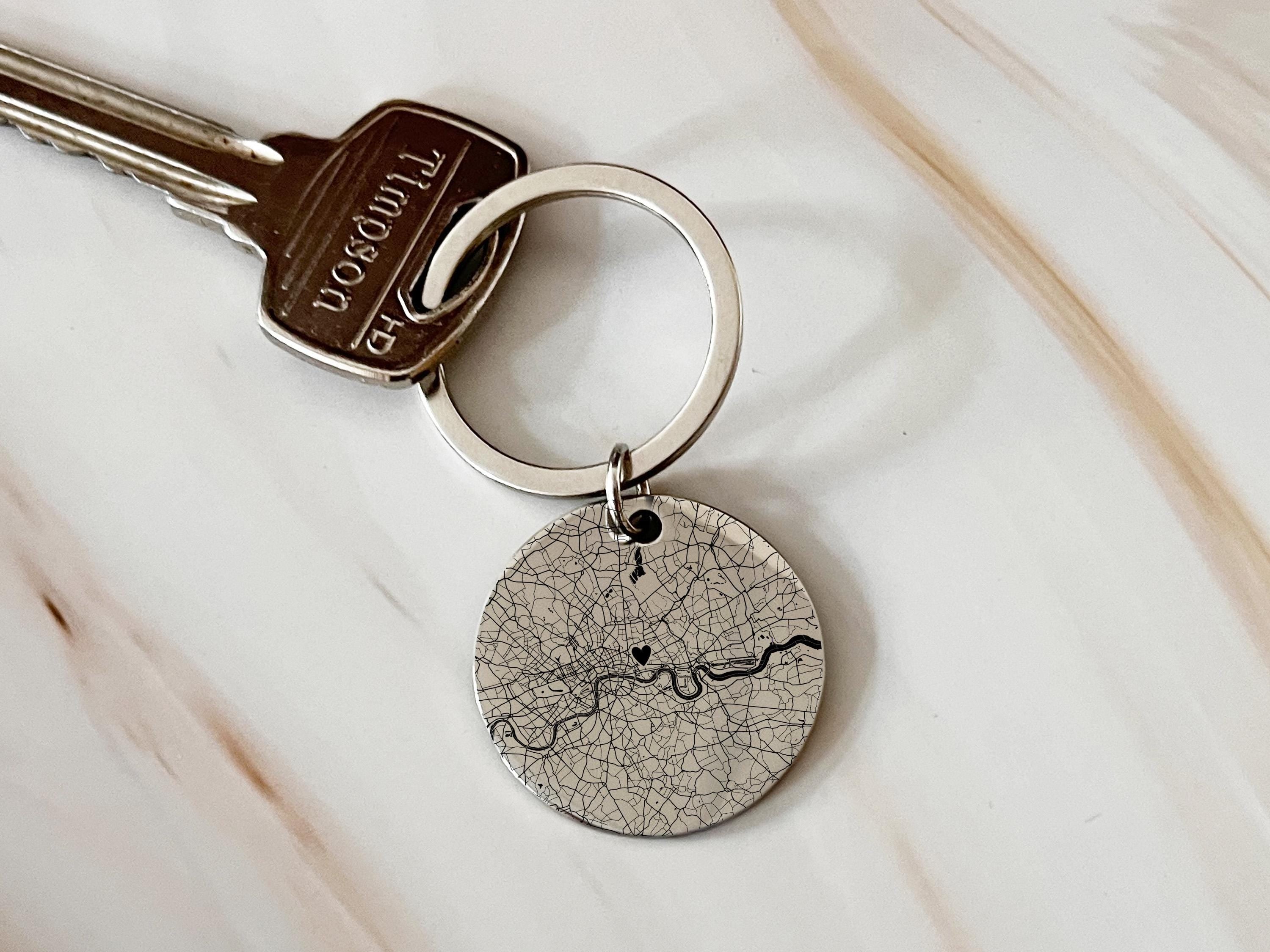 Custom location keyring gift for couples, featuring engraved map and names