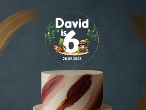 a cake with a topper that says david is 6