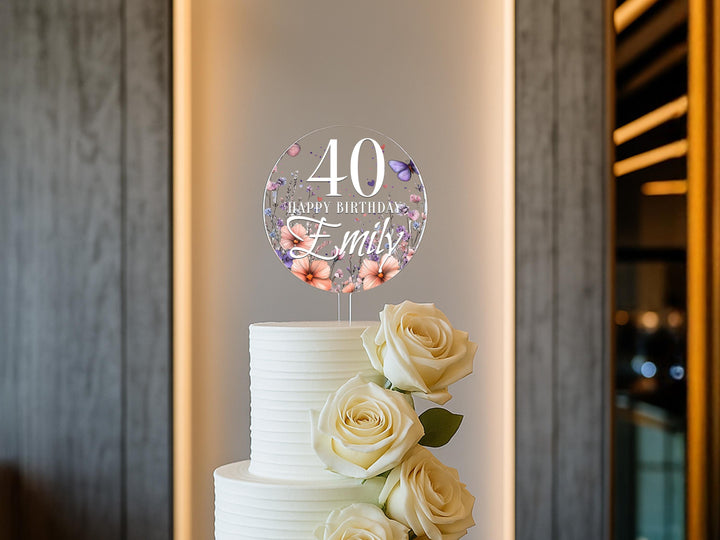 a white cake with flowers on top of it