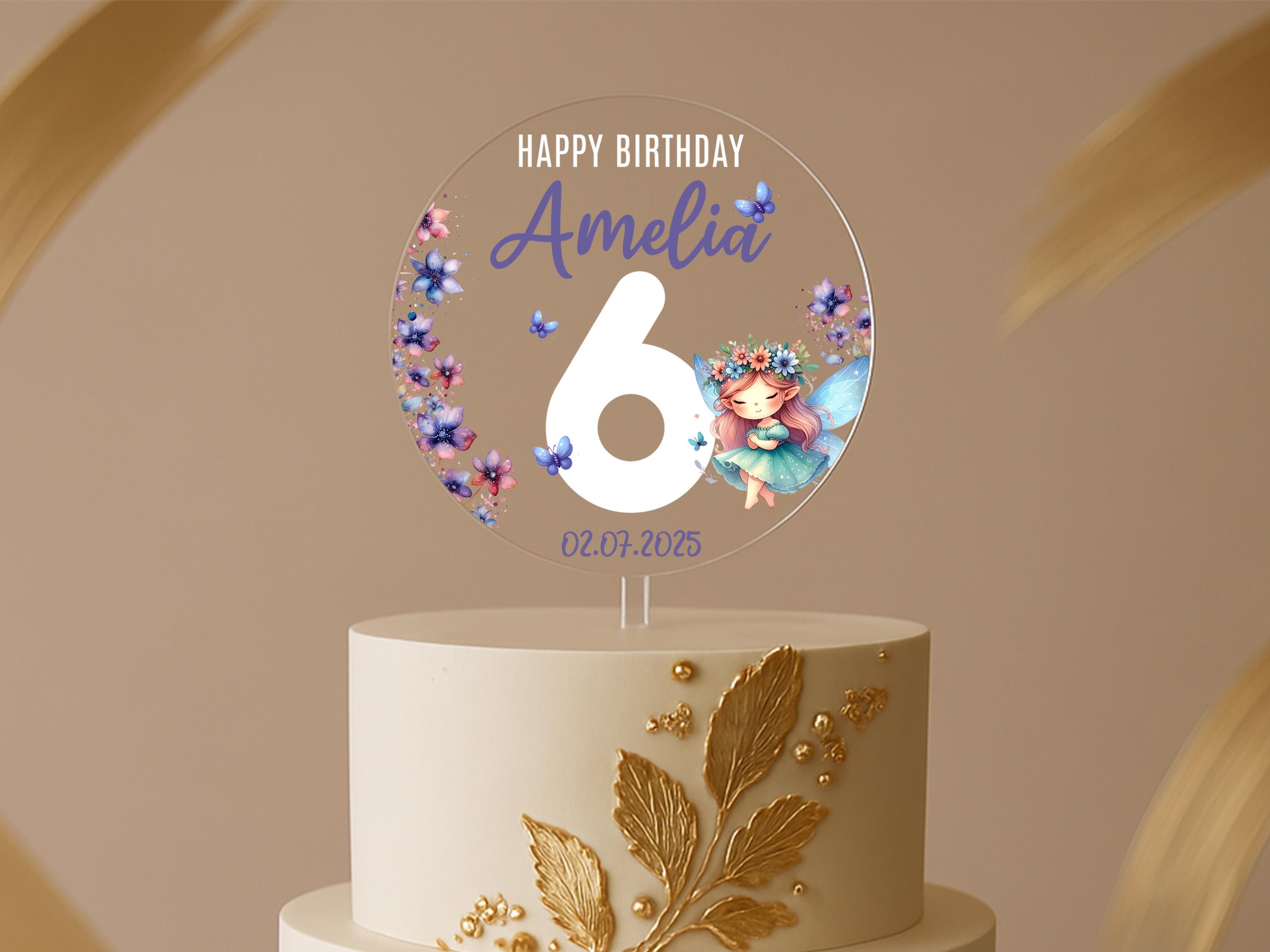 a birthday cake with the number six on it