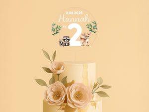 a three tiered cake with flowers on top