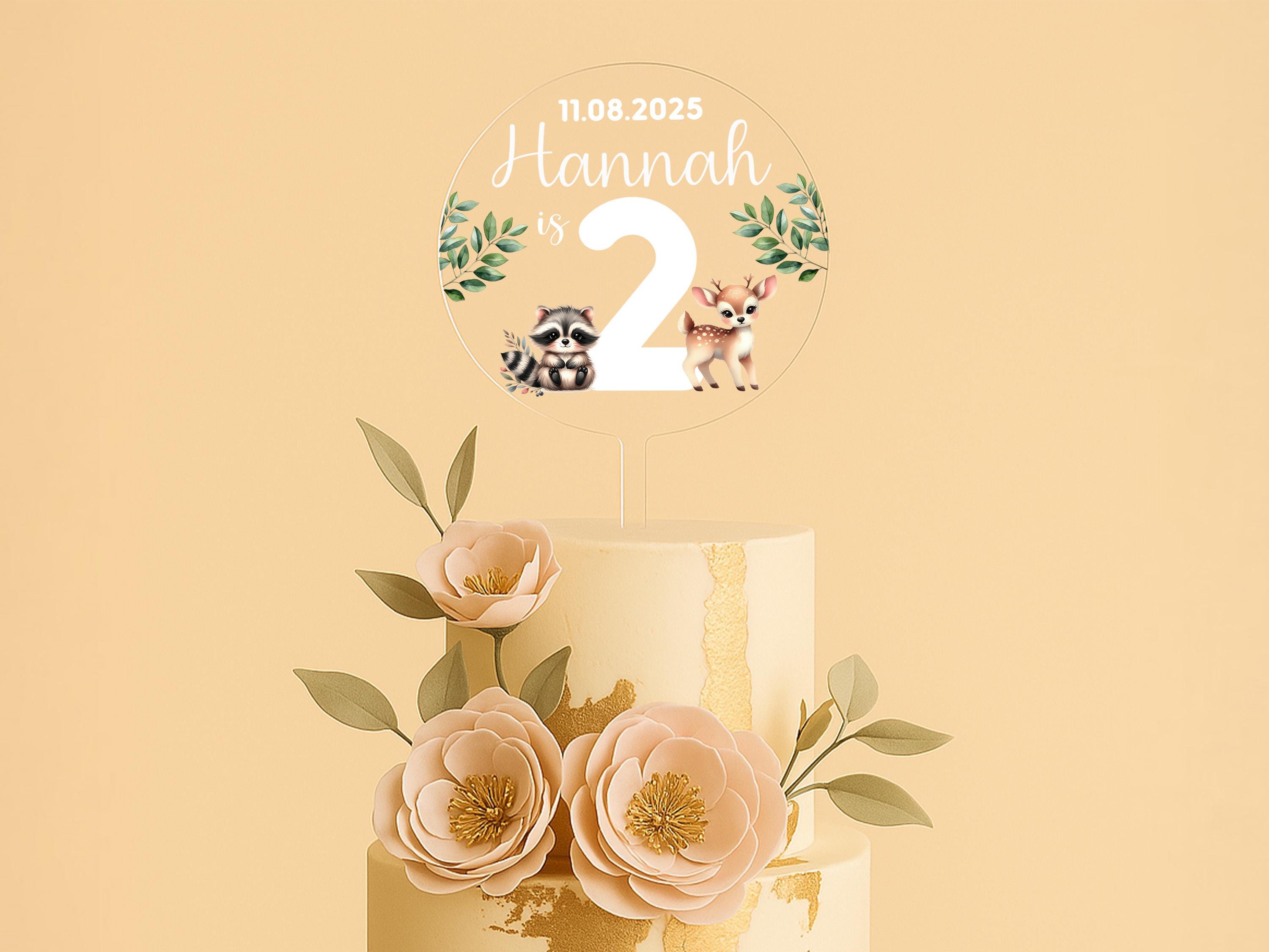 a three tiered cake with flowers on top