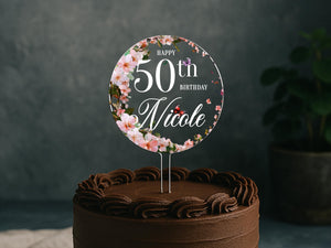 a chocolate cake with a 50th birthday sign on top