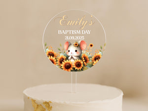 a cake with a cake topper with a picture of a mouse on it