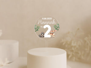 a white cake with a cake topper on it