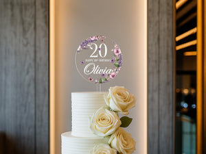 a white cake with flowers on top of it