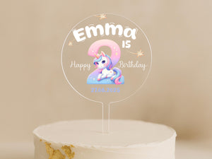 Birthday cake with personalised unicorn topper and date