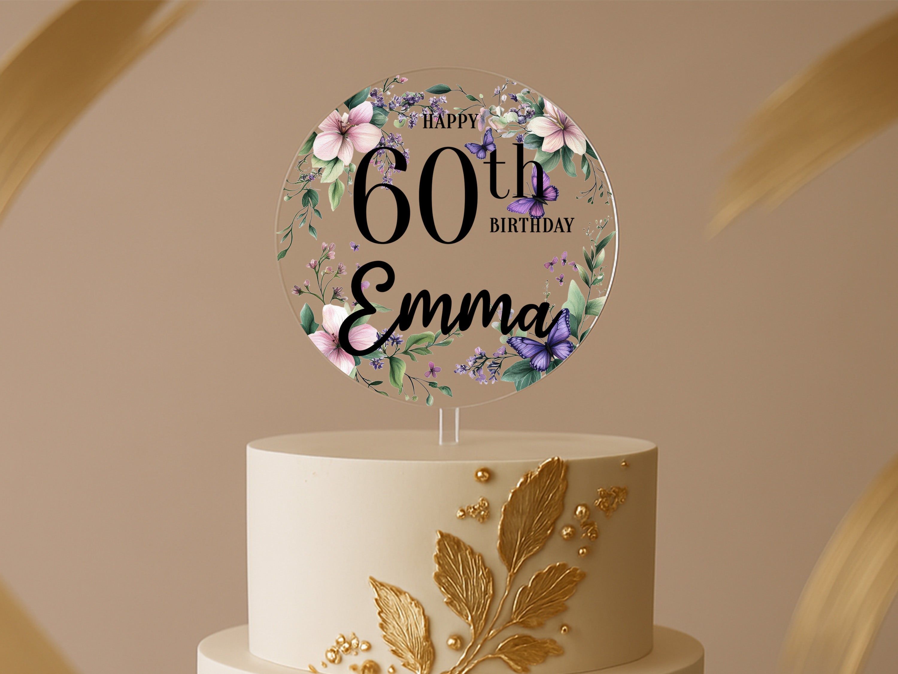 a birthday cake with a floral design on top