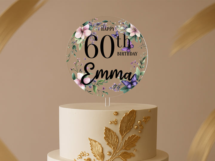 a birthday cake with a floral design on top