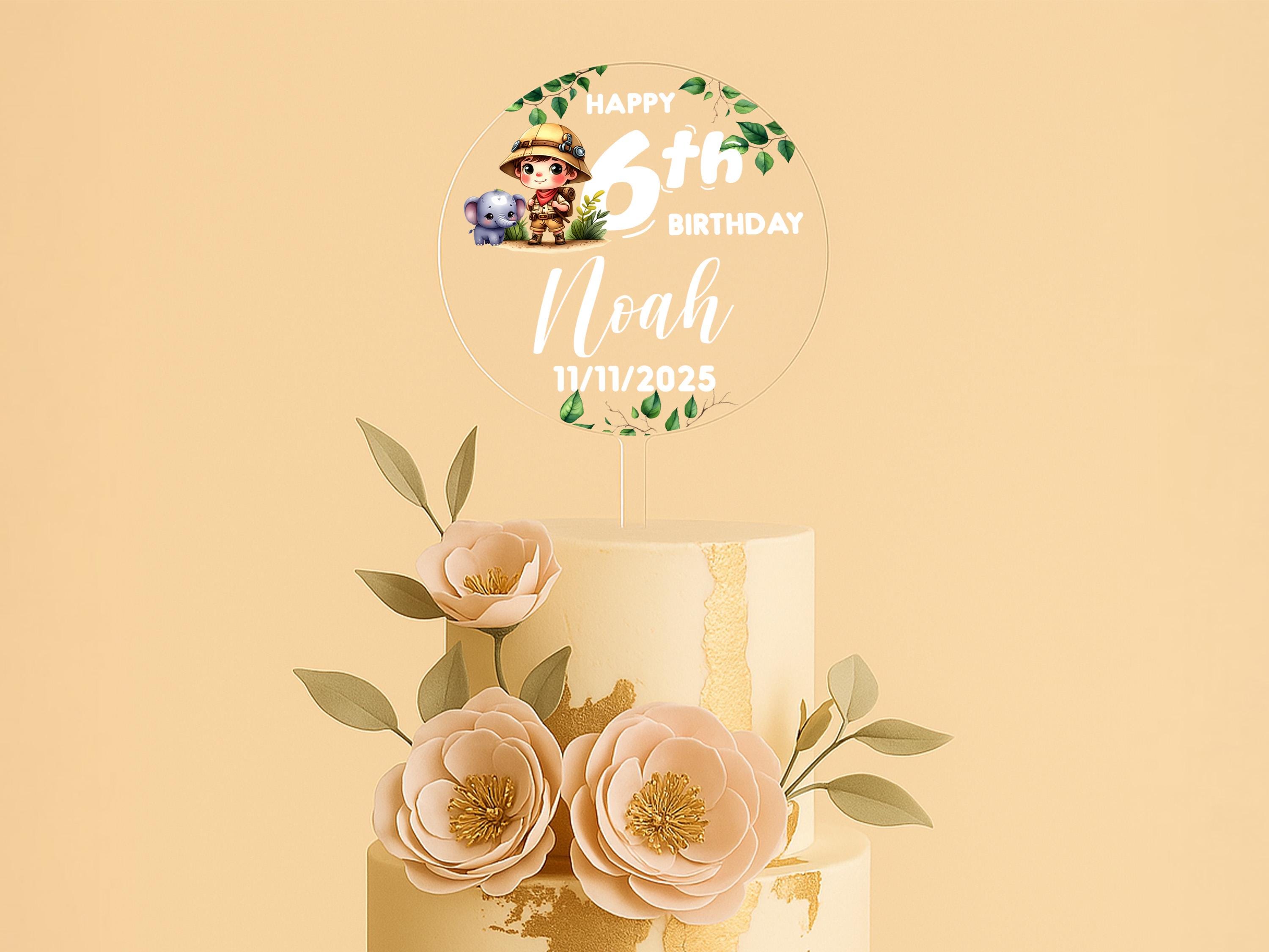 a three tiered cake with flowers on top of it