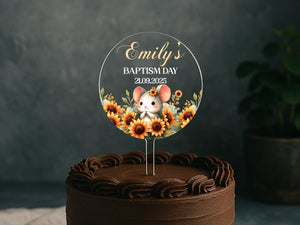 a cake with a mouse on top of it