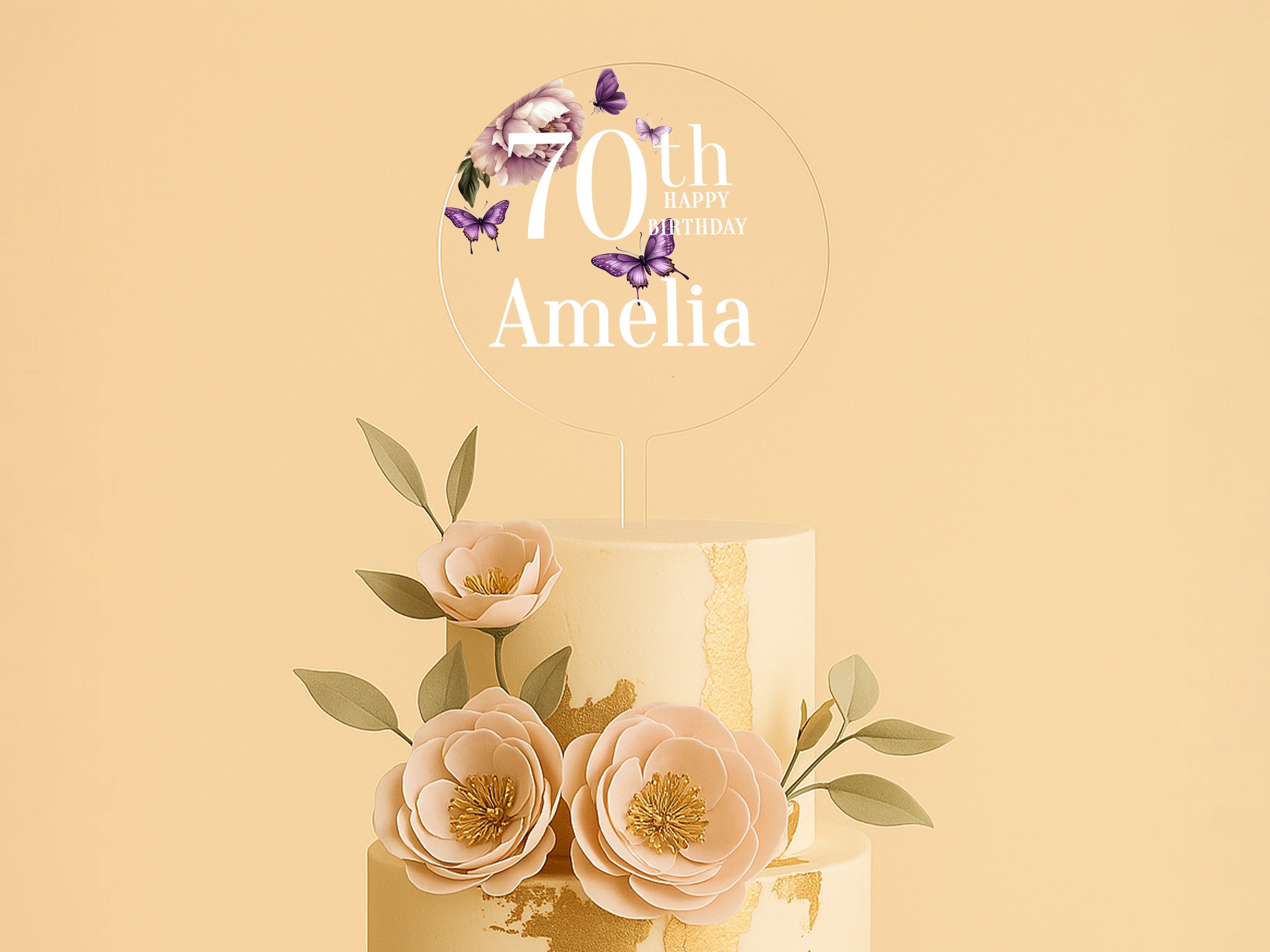 a three tiered cake with flowers on top of it