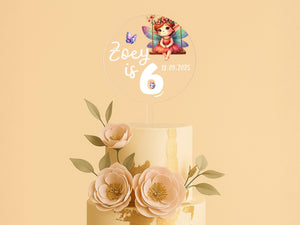 a three tiered cake with flowers on top
