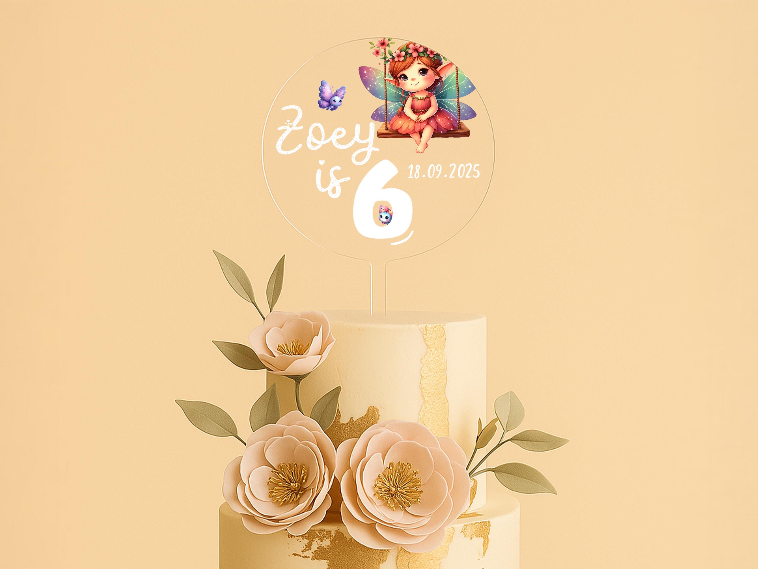 a three tiered cake with flowers on top