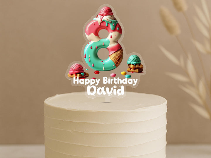 Custom ice cream dessert cake topper featuring number 6 with sweet ice cream treats, cones and personalised name David on celebration cake