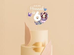 a three tiered cake with a cartoon character on top