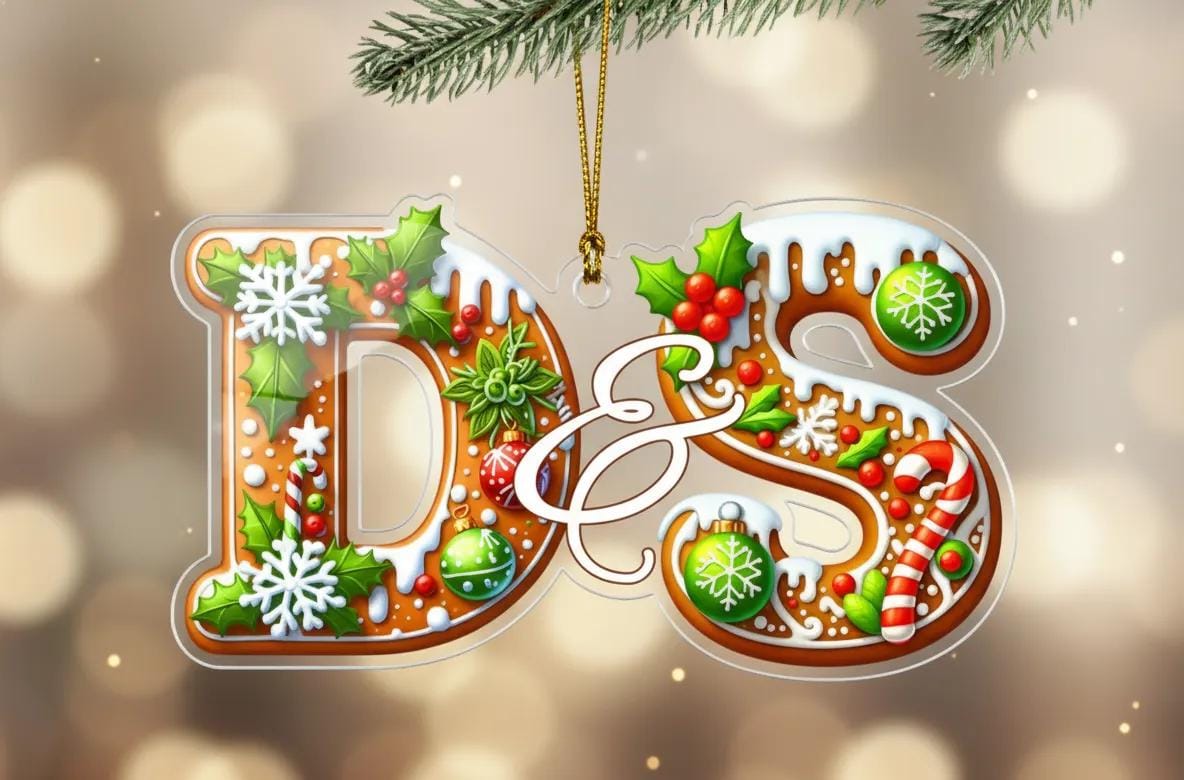 A decorative ornament made up of various holiday-themed elements, including snowflakes, holly leaves, berries, and candy canes, forming the letters 'D&S' against a blurred background.