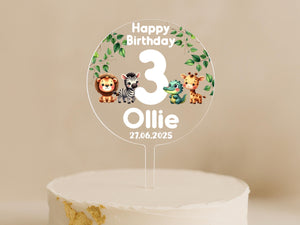 Personalised jungle animal cake topper featuring lion, zebra, crocodile, and giraffe with child's name and age.