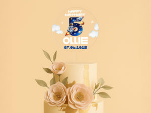 a three tiered cake with flowers on top of it
