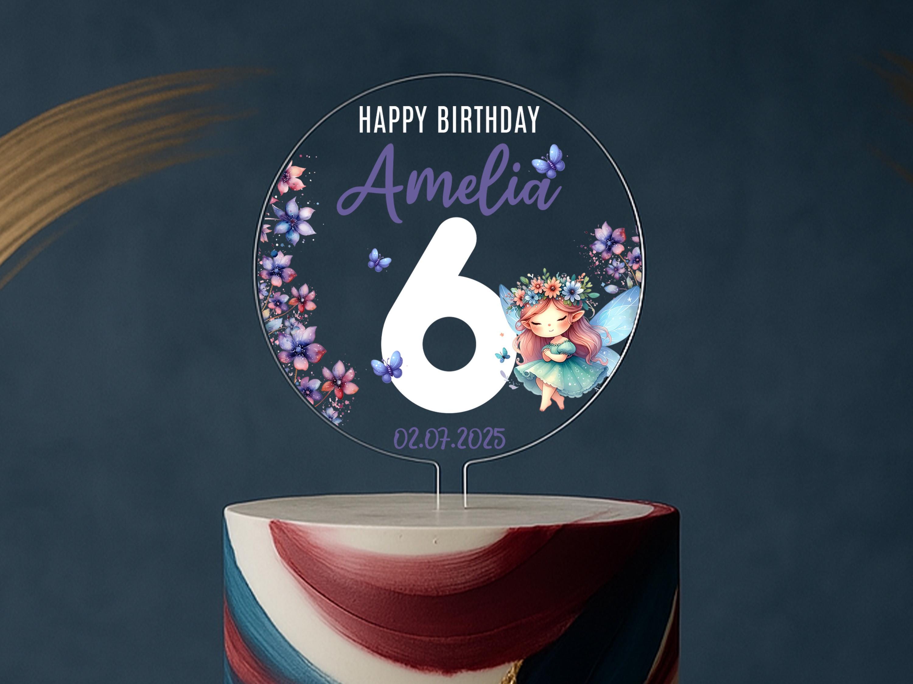 a birthday cake with the number six on it