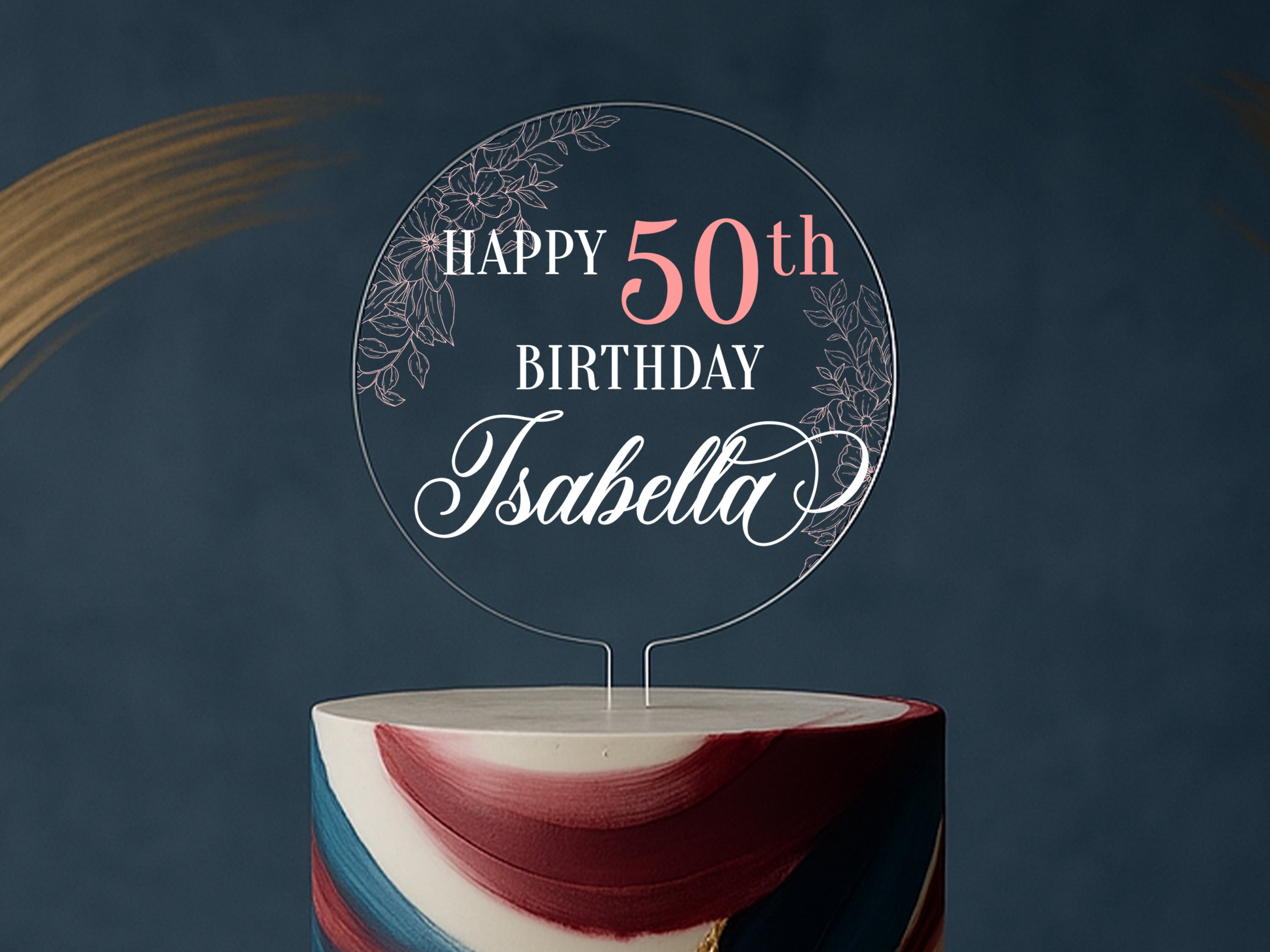 a birthday cake with a cake topper that says happy 50th