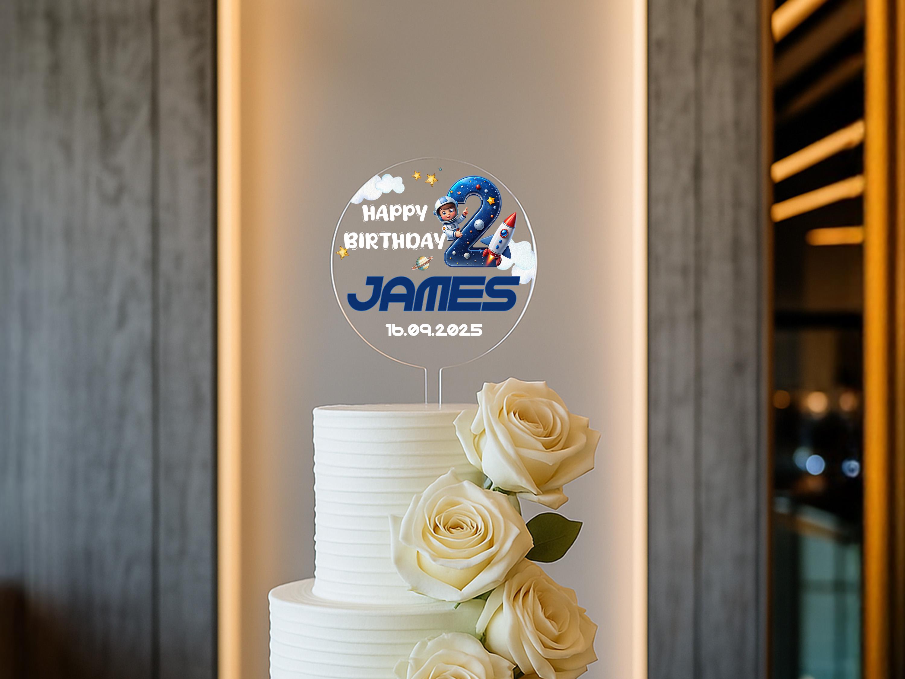 a white cake with white roses on a table