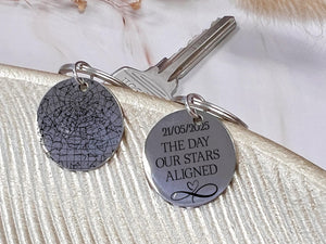 Matte black keyring featuring engraved night sky and back message