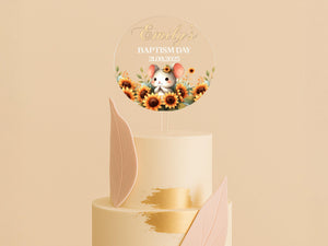 a cake with a mouse on top of it