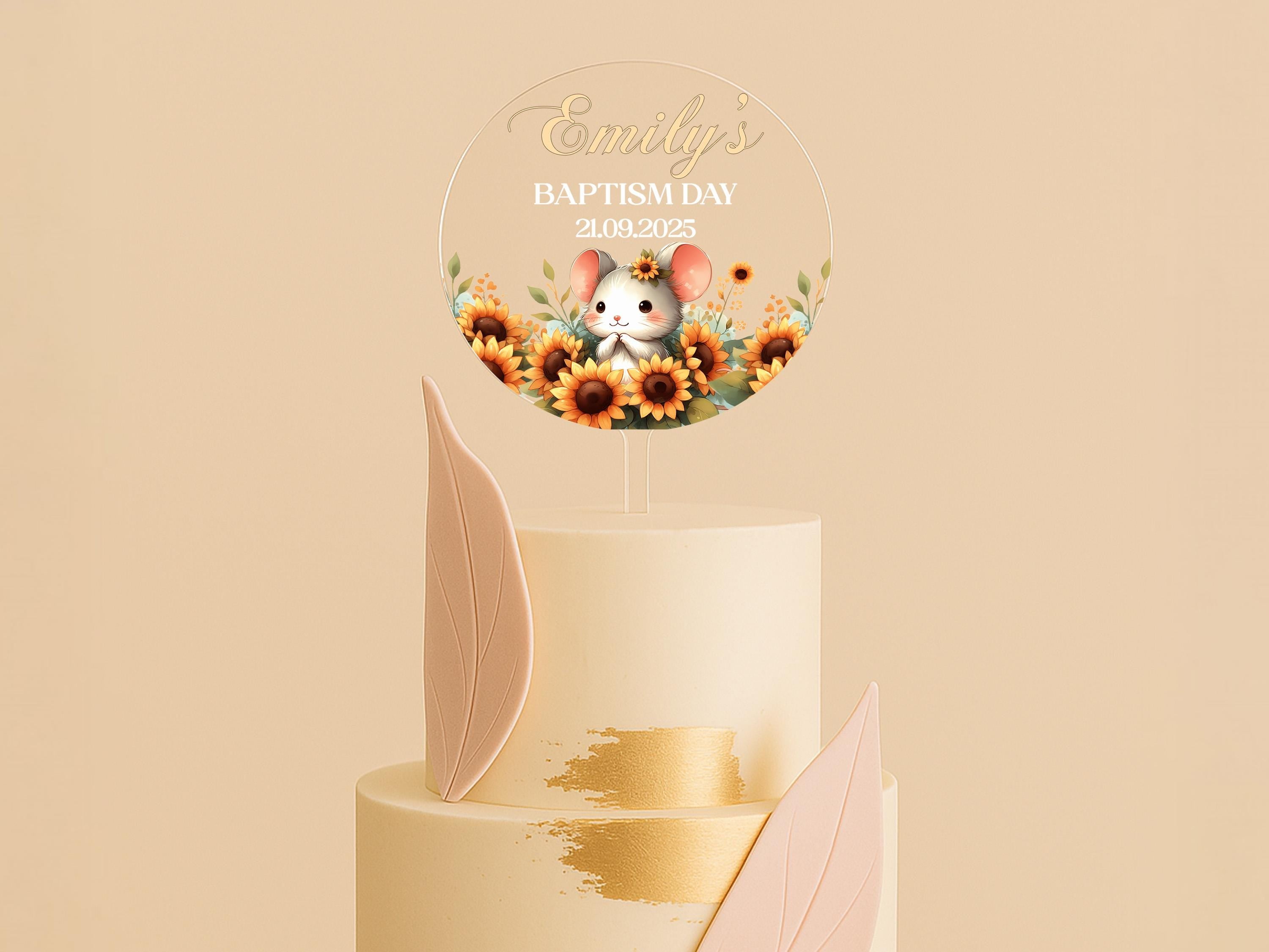 a cake with a mouse on top of it