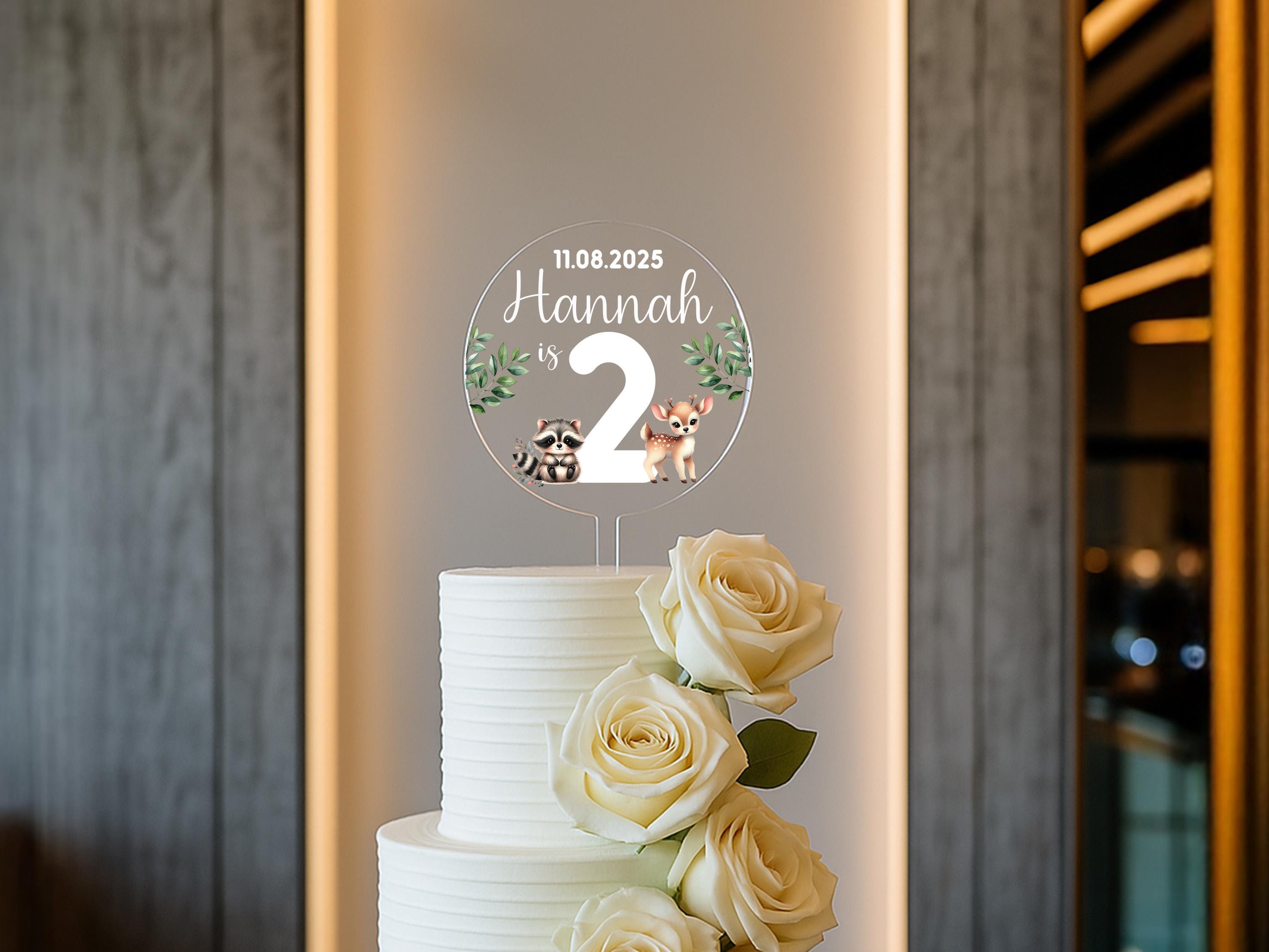 a white wedding cake with flowers on top