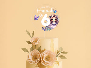 a three tiered cake with flowers on top of it
