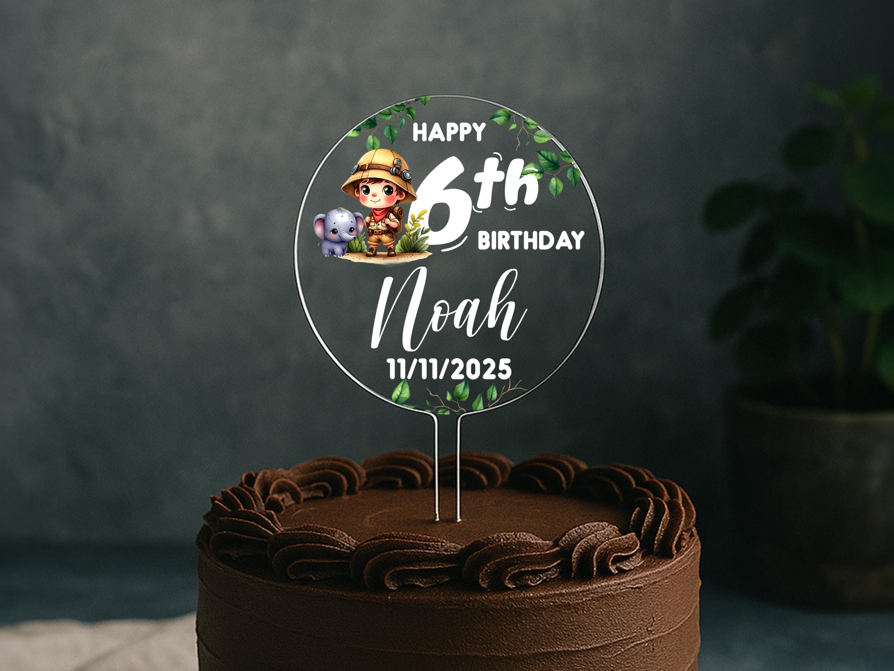 a birthday cake with a name and a picture on it