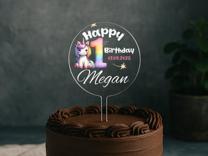a birthday cake with a happy 1st birthday cake topper