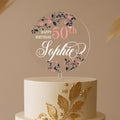 Round floral 50th birthday cake topper with navy and pink flowers