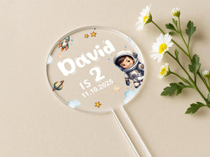 a magnifying glass with a picture of an astronaut on it