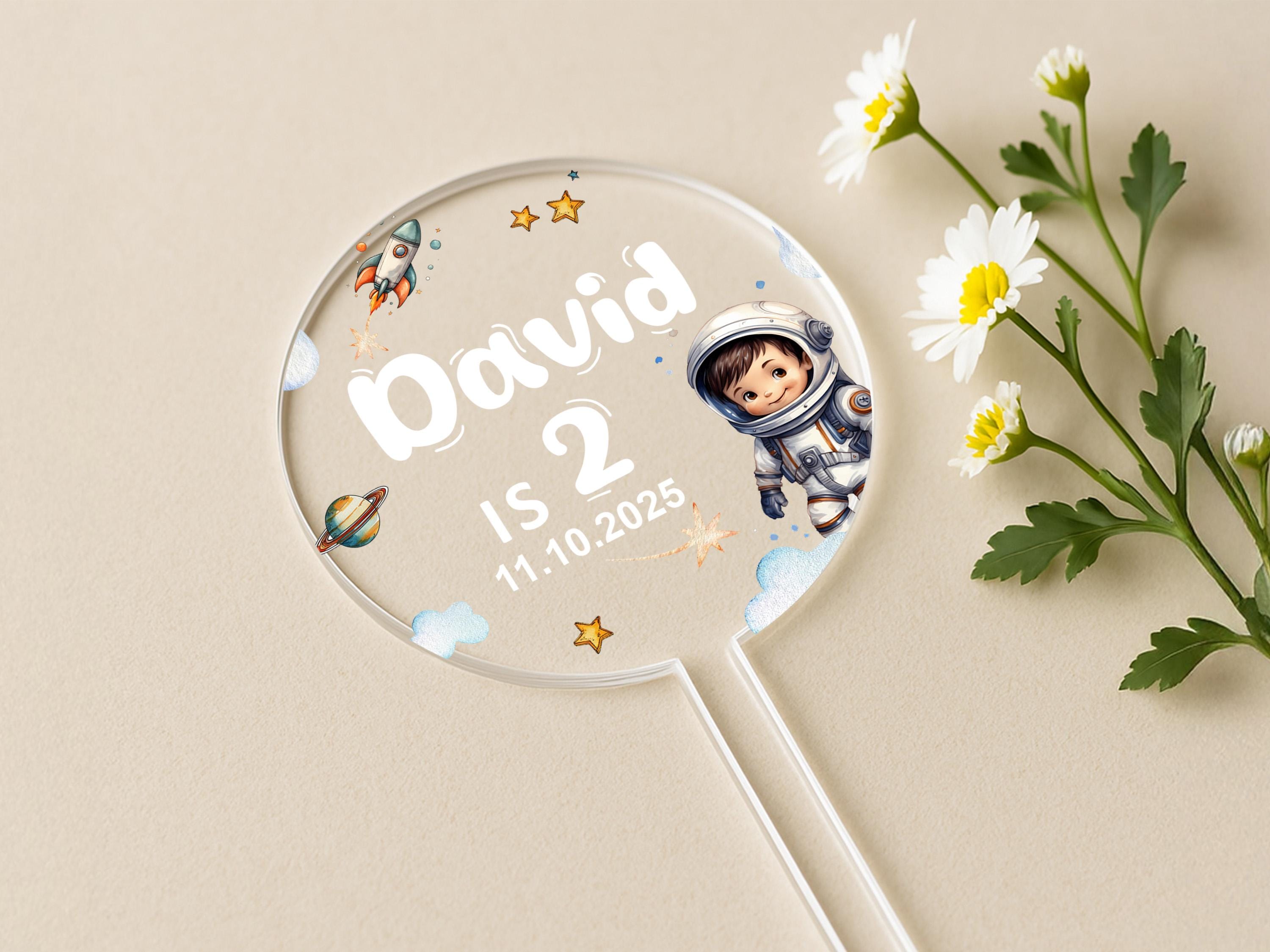 a magnifying glass with a picture of an astronaut on it