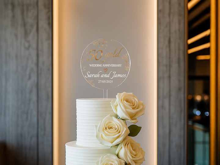 a white wedding cake with white roses on top