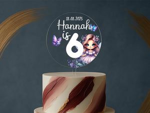 a birthday cake with a picture of a girl on top