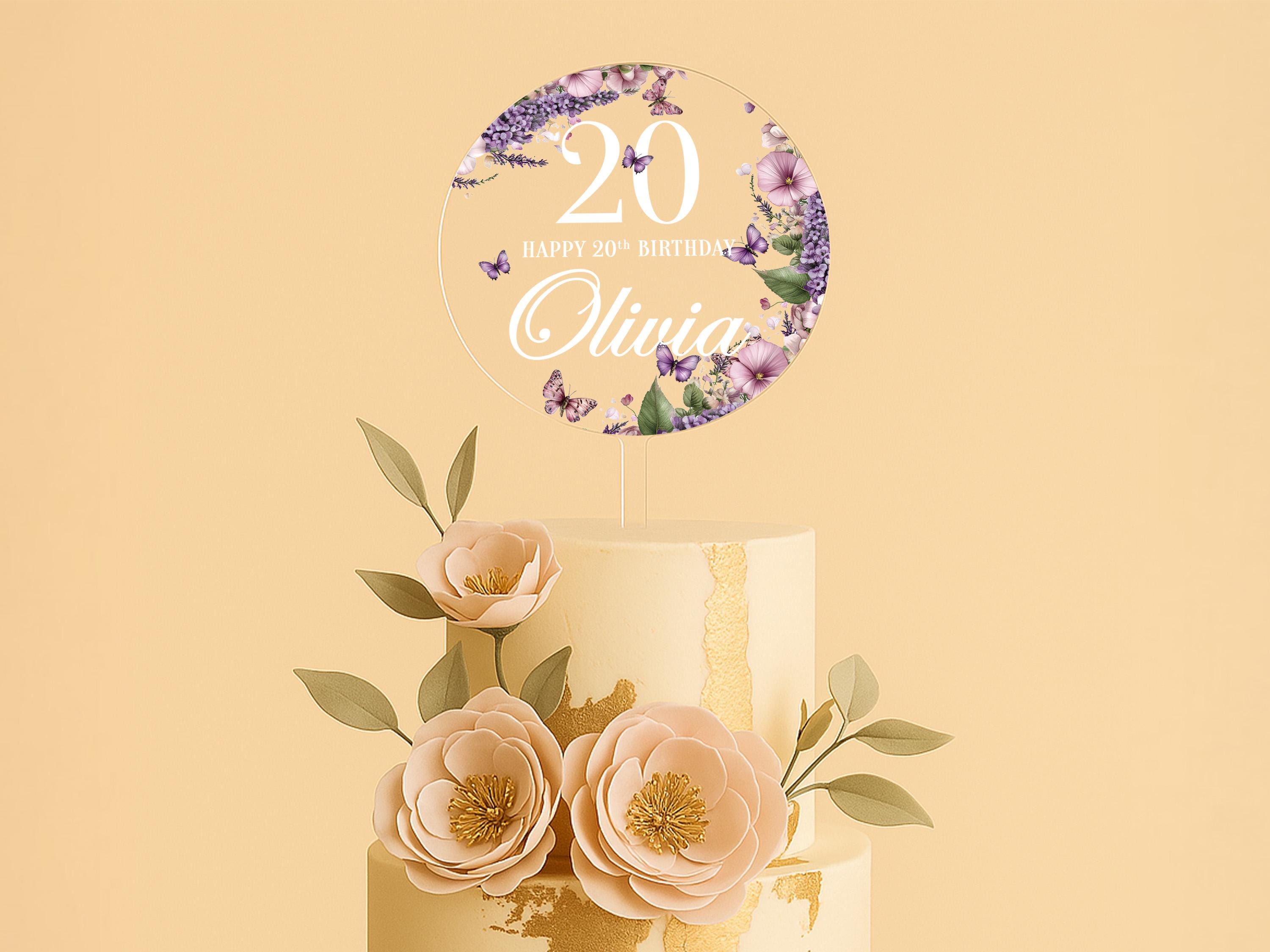 a birthday cake with flowers on top of it